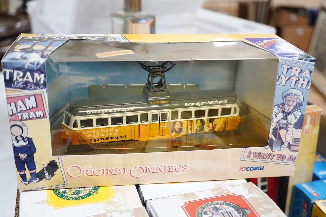 Forty-five boxed diecast trams, buses and other commercial vehicles by Corgi Classic, Corgi OOC, and EFE, operators include Leeds tram, the Tate & Lyle Story set, Blackpool Corporation Transport (seven examples), Thornyc